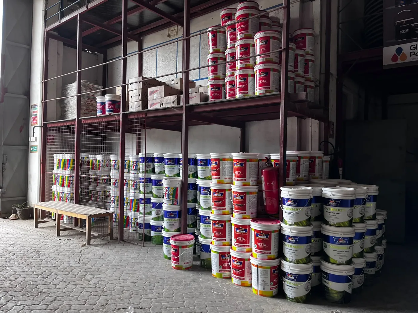 Paint products displayed in the Denset supply area
